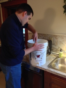 Matt cleans and sanitizes.