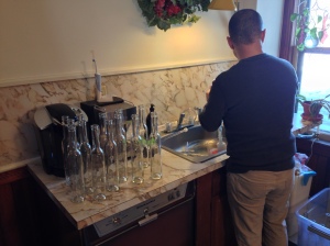 Tim cleans the half size 375 ml Bellissima bottles.  We will fill 30 of these.