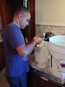 Tim mixing up the cleanser.